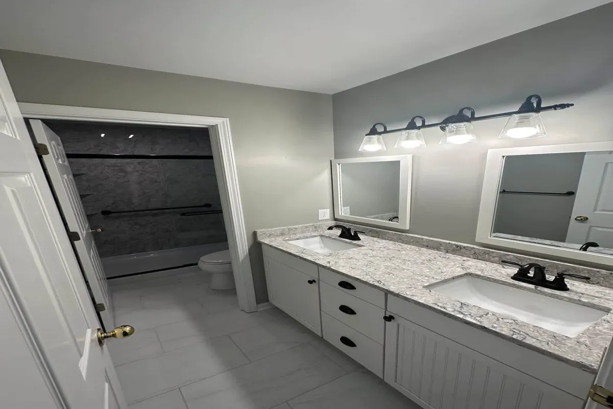 Double vanity mirrors with white bathroom design