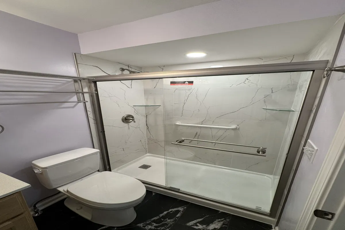 Walk in shower conversion with grab bars age in place features
