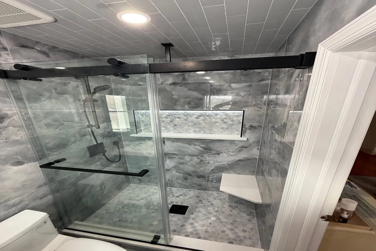 Walk in shower remodel with gray design