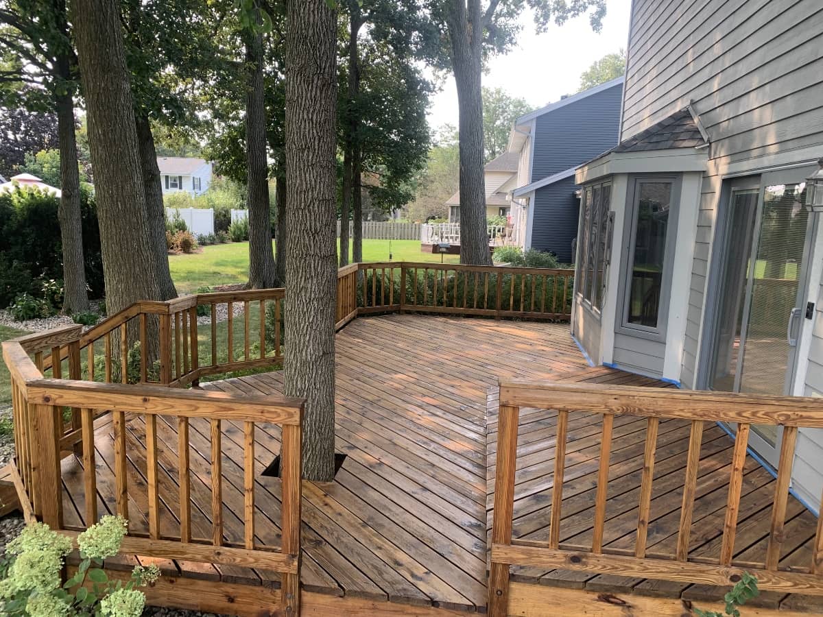 Wood deck restoration with railings