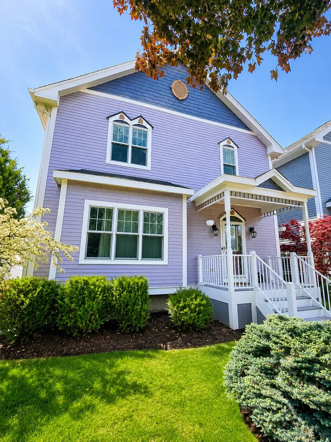 Lavender Victorian home exterior painting